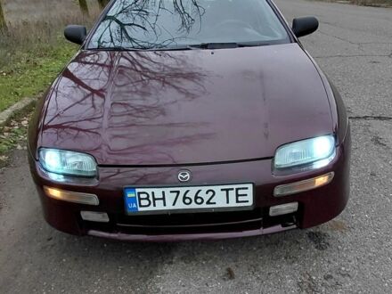 Красный Мазда 323, объемом двигателя 1.5 л и пробегом 152 тыс. км за 1600 $, фото 1 на Automoto.ua