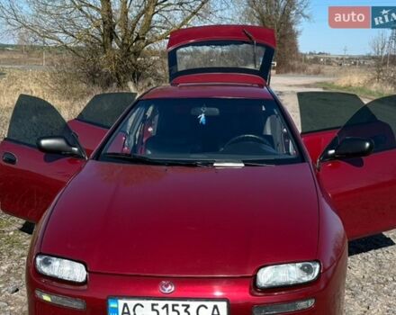 Красный Мазда 323, объемом двигателя 1.49 л и пробегом 301 тыс. км за 2999 $, фото 1 на Automoto.ua