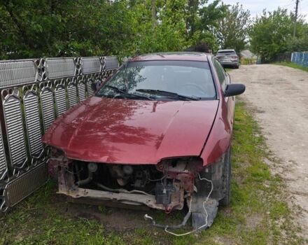 Красный Мазда 323, объемом двигателя 1.5 л и пробегом 500 тыс. км за 1000 $, фото 1 на Automoto.ua