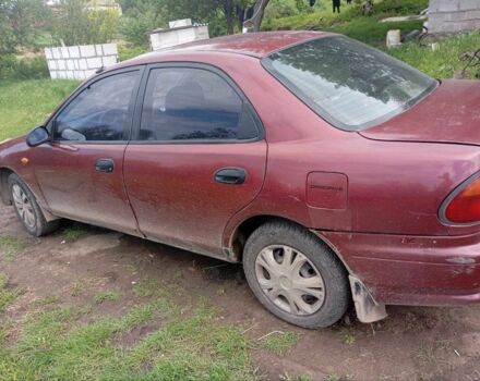 Красный Мазда 323, объемом двигателя 1.5 л и пробегом 2 тыс. км за 1113 $, фото 1 на Automoto.ua
