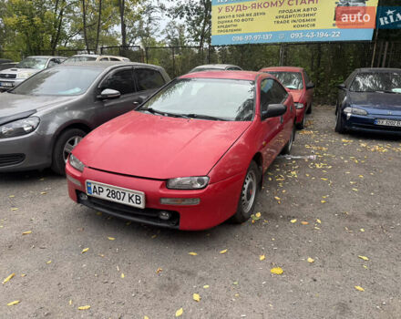Красный Мазда 323, объемом двигателя 1.5 л и пробегом 160 тыс. км за 1500 $, фото 1 на Automoto.ua