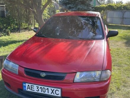 Мазда 323 1997 у Дніпро (Дніпропетровську) на Automoto.ua Червоний Мазда 323, об'ємом двигуна 1.5 л та пробігом 323 тис. км за 2800 $, фото 1 на Automoto.ua