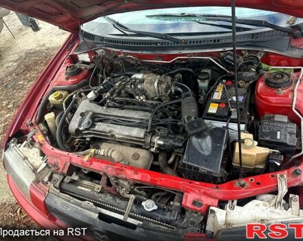 Червоний Мазда 323, об'ємом двигуна 1.5 л та пробігом 300 тис. км за 2200 $, фото 1 на Automoto.ua