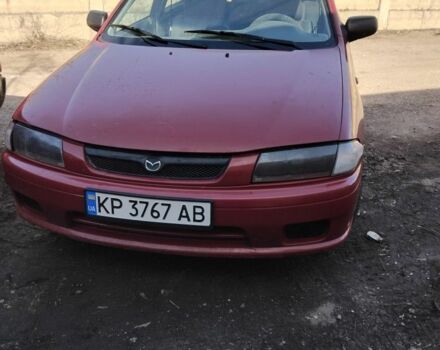 Червоний Мазда 323, об'ємом двигуна 1.5 л та пробігом 520 тис. км за 1500 $, фото 1 на Automoto.ua
