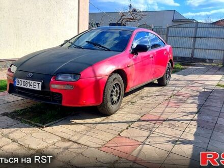 Мазда 323 1998 у Полтаві на Automoto.ua Червоний Мазда 323, об'ємом двигуна 1.5 л та пробігом 250 тис. км за 1300 $, фото 1 на Automoto.ua