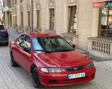 Червоний Мазда 323, об'ємом двигуна 1.49 л та пробігом 250 тис. км за 1650 $, фото 1 на Automoto.ua