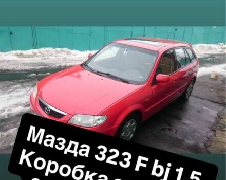 Красный Мазда 323, объемом двигателя 1.5 л и пробегом 189 тыс. км за 900 $, фото 1 на Automoto.ua