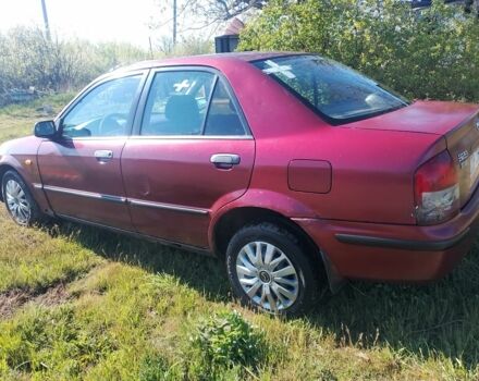 Красный Мазда 323, объемом двигателя 2 л и пробегом 1 тыс. км за 1100 $, фото 1 на Automoto.ua