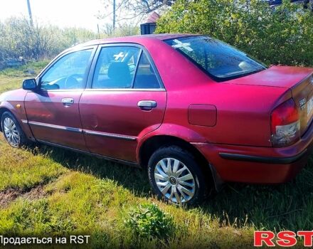 Красный Мазда 323, объемом двигателя 2 л и пробегом 0 тыс. км за 1200 $, фото 1 на Automoto.ua