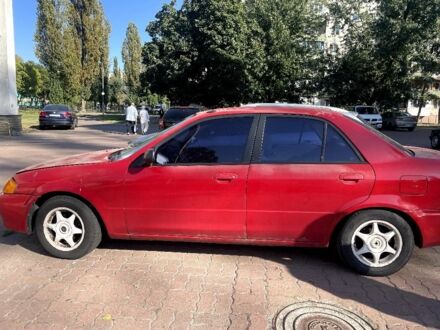 Червоний Мазда 323, об'ємом двигуна 1.6 л та пробігом 200 тис. км за 2000 $, фото 1 на Automoto.ua