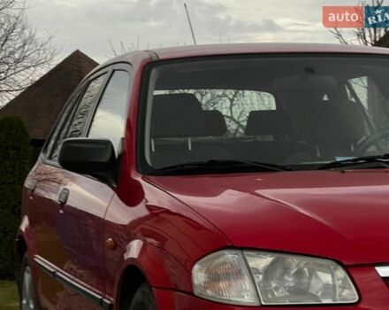 Красный Мазда 323, объемом двигателя 1.49 л и пробегом 278 тыс. км за 3800 $, фото 1 на Automoto.ua