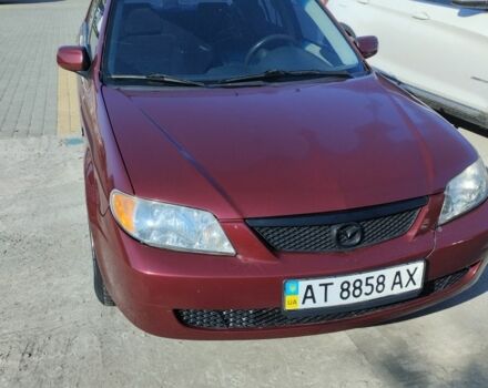 Красный Мазда 323, объемом двигателя 2 л и пробегом 100 тыс. км за 846 $, фото 1 на Automoto.ua