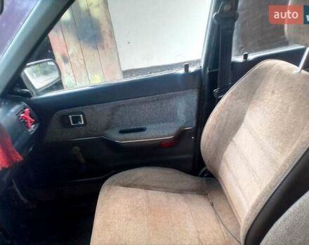 Мазда 323, объемом двигателя 1.7 л и пробегом 250 тыс. км за 900 $, фото 8 на Automoto.ua