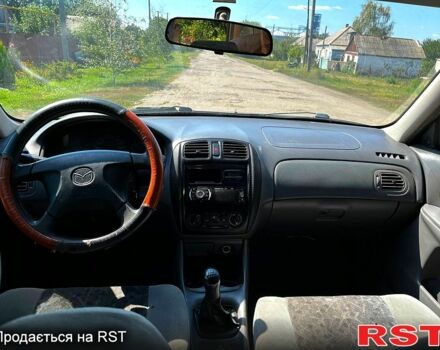 Мазда 323, об'ємом двигуна 1.5 л та пробігом 188 тис. км за 650 $, фото 4 на Automoto.ua
