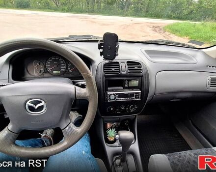 Мазда 323, об'ємом двигуна 1.5 л та пробігом 178 тис. км за 2400 $, фото 4 на Automoto.ua