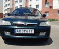 Мазда 323, объемом двигателя 1.5 л и пробегом 300 тыс. км за 2800 $, фото 6 на Automoto.ua