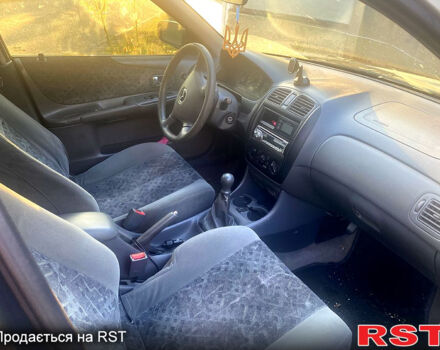 Мазда 323, объемом двигателя 1.3 л и пробегом 246 тыс. км за 1650 $, фото 3 на Automoto.ua