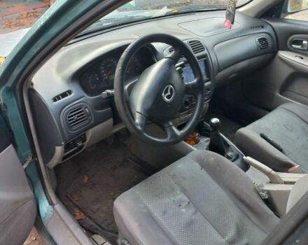 Мазда 323, объемом двигателя 1.6 л и пробегом 360 тыс. км за 1449 $, фото 7 на Automoto.ua