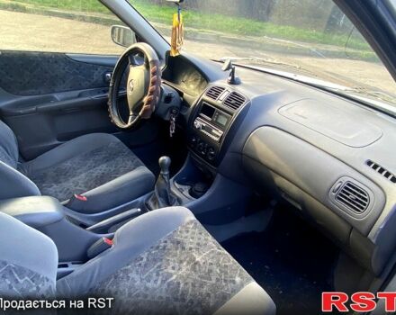Мазда 323, объемом двигателя 1.3 л и пробегом 250 тыс. км за 2000 $, фото 4 на Automoto.ua