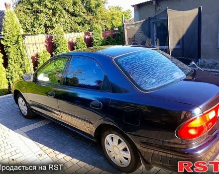Мазда 323, объемом двигателя 1.6 л и пробегом 80 тыс. км за 1800 $, фото 3 на Automoto.ua