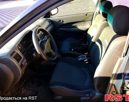 Мазда 323, объемом двигателя 1.6 л и пробегом 80 тыс. км за 1800 $, фото 4 на Automoto.ua