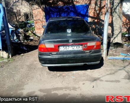 Мазда 323, объемом двигателя 16 л и пробегом 0 тыс. км за 1200 $, фото 4 на Automoto.ua