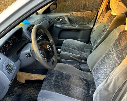 Мазда 323, объемом двигателя 1.5 л и пробегом 220 тыс. км за 2000 $, фото 5 на Automoto.ua