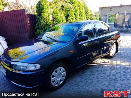 Мазда 323, объемом двигателя 1.6 л и пробегом 80 тыс. км за 1800 $, фото 1 на Automoto.ua