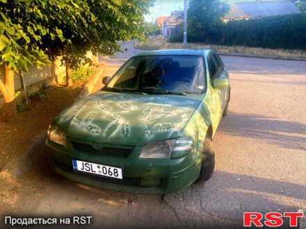Мазда 323, объемом двигателя 1.3 л и пробегом 246 тыс. км за 1650 $, фото 1 на Automoto.ua