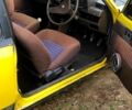 Желтый Мазда 323, объемом двигателя 13 л и пробегом 300 тыс. км за 350 $, фото 1 на Automoto.ua