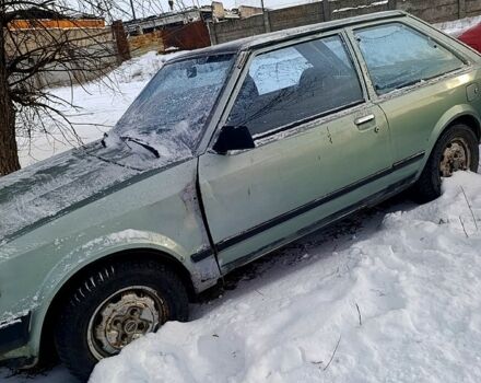 Серый Мазда 323, объемом двигателя 1.3 л и пробегом 300 тыс. км за 350 $, фото 1 на Automoto.ua