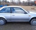 Серый Мазда 323, объемом двигателя 1.5 л и пробегом 250 тыс. км за 400 $, фото 1 на Automoto.ua