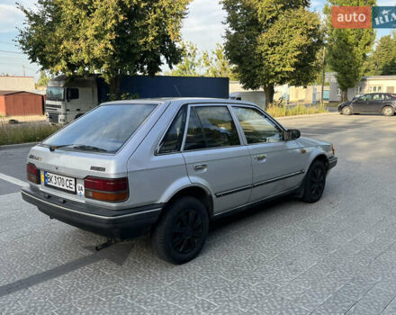 Сірий Мазда 323, об'ємом двигуна 1.32 л та пробігом 260 тис. км за 890 $, фото 11 на Automoto.ua
