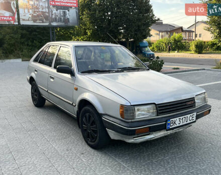 Сірий Мазда 323, об'ємом двигуна 1.32 л та пробігом 260 тис. км за 890 $, фото 1 на Automoto.ua