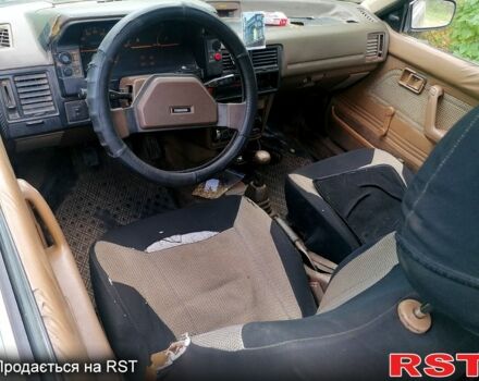 Серый Мазда 323, объемом двигателя 1.5 л и пробегом 500 тыс. км за 380 $, фото 3 на Automoto.ua