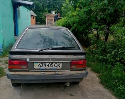 Серый Мазда 323, объемом двигателя 1.5 л и пробегом 500 тыс. км за 380 $, фото 1 на Automoto.ua