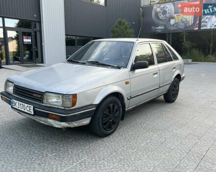 Сірий Мазда 323, об'ємом двигуна 1.32 л та пробігом 260 тис. км за 890 $, фото 9 на Automoto.ua
