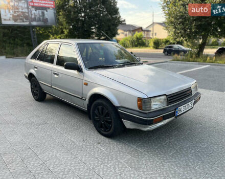 Сірий Мазда 323, об'ємом двигуна 1.32 л та пробігом 260 тис. км за 890 $, фото 7 на Automoto.ua