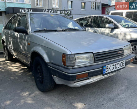 Серый Мазда 323, объемом двигателя 1.32 л и пробегом 255 тыс. км за 900 $, фото 8 на Automoto.ua