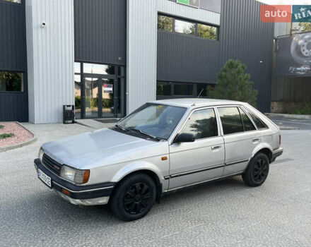 Сірий Мазда 323, об'ємом двигуна 1.32 л та пробігом 260 тис. км за 890 $, фото 8 на Automoto.ua