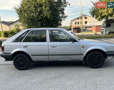 Сірий Мазда 323, об'ємом двигуна 1.32 л та пробігом 260 тис. км за 890 $, фото 10 на Automoto.ua