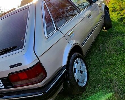 Серый Мазда 323, объемом двигателя 1.3 л и пробегом 454 тыс. км за 850 $, фото 2 на Automoto.ua