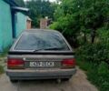 Серый Мазда 323, объемом двигателя 1.5 л и пробегом 500 тыс. км за 380 $, фото 1 на Automoto.ua