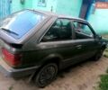 Серый Мазда 323, объемом двигателя 1.5 л и пробегом 500 тыс. км за 380 $, фото 1 на Automoto.ua