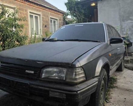 Серый Мазда 323, объемом двигателя 1.5 л и пробегом 400 тыс. км за 603 $, фото 2 на Automoto.ua