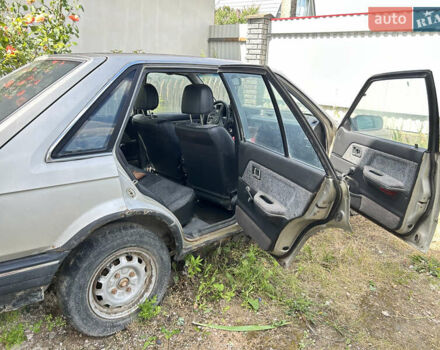 Серый Мазда 323, объемом двигателя 1.3 л и пробегом 200 тыс. км за 1001 $, фото 13 на Automoto.ua