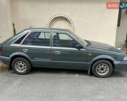 Сірий Мазда 323, об'ємом двигуна 1.32 л та пробігом 342 тис. км за 1100 $, фото 2 на Automoto.ua