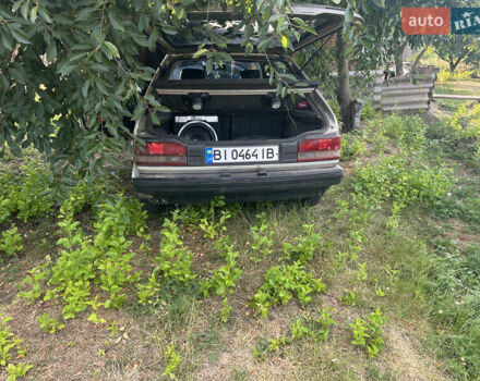 Серый Мазда 323, объемом двигателя 1.32 л и пробегом 153 тыс. км за 1075 $, фото 3 на Automoto.ua