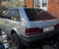 Серый Мазда 323, объемом двигателя 1.5 л и пробегом 100 тыс. км за 448 $, фото 1 на Automoto.ua