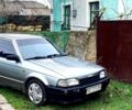 Серый Мазда 323, объемом двигателя 1.3 л и пробегом 400 тыс. км за 1300 $, фото 1 на Automoto.ua